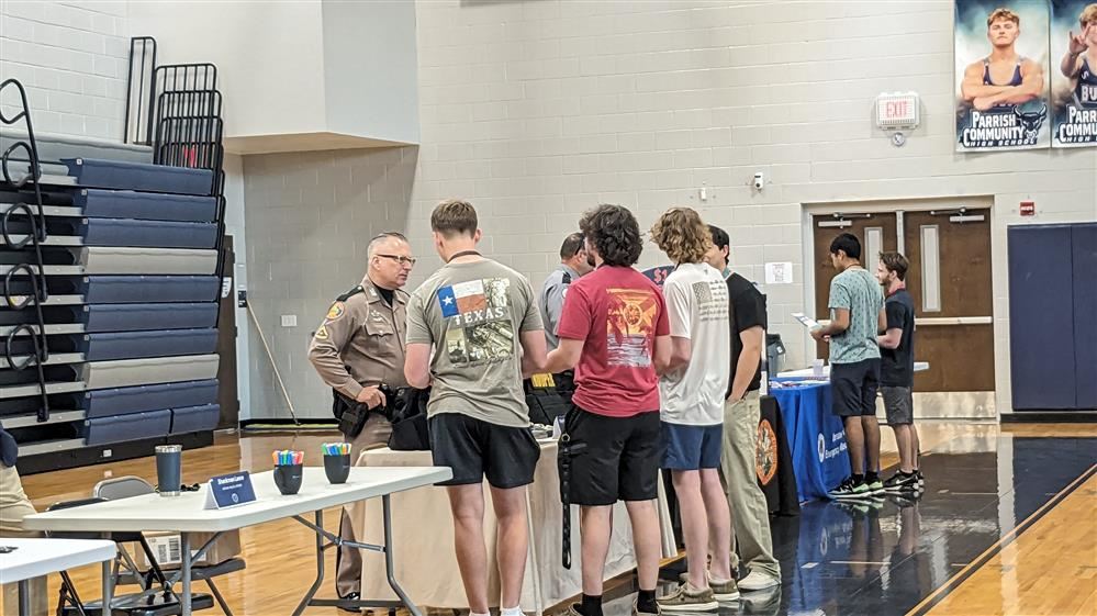  Students at booth at PCHS career fair